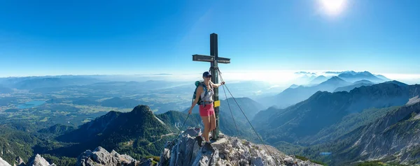 Woman Sport Bra Standing Metal Cross Panoramic View Alps Top — Stock fotografie
