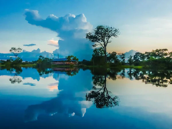 The cloud formations after a storm in the amazon rainforest are amazing and unique. The reflections in the water are an artistic masterpiece