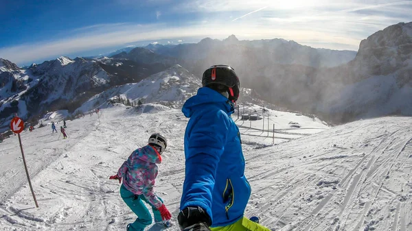 Skiing Man Snowboarding Woman Going Slope Nassfeld Austria Man Holding — Foto de Stock