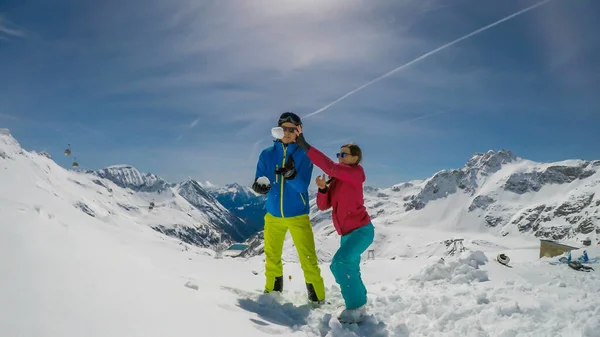 Couple Skiing Outfits Playing Powder Snow Throwing Snow Balls Laughing — Foto de Stock