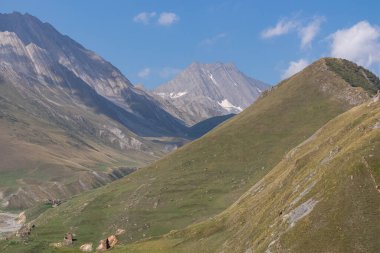 A view on the sharp ridges in Ossetia from the Truso Valley near the Ketrisi Village Kazbegi District, Mtskheta in the Greater Caucasus Mountains, Georgia. Russian Border. Trekking, Wanderlust. clipart