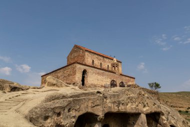 Ancient cave city of Uplistsikhe overlooking the Mtkvari river, in the Shida Kartli Region of Georgia, Caucasus, Eastern Europe. Church of the Prince at Uplistsikhe. Near Gori. Historical place clipart