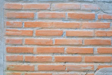 Eski ve kırsal kırmızı tuğla duvarın arka planı