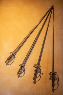 Background with four ancient swords