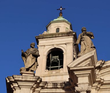 Medieval sculpture of a saint, cloister gallery of the Chiesa di San Marco, Bergamo. Urban architectural photography. High quality picture