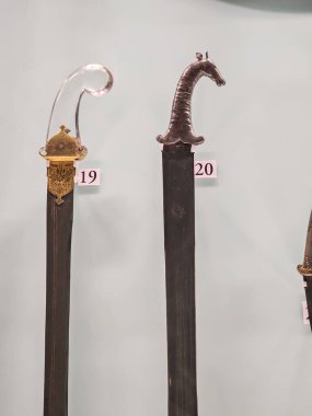 A picture of Rajput sword with a handle designed as head of a horse, it was weapons in Mewar army in Rajasthan from 16th century to 20th century  clipart