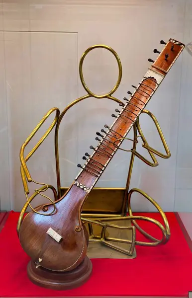 Stock image The picture of a Sitar which is a plucked stringed instrument, originating from the Indian subcontinent, used in Hindustani classical music