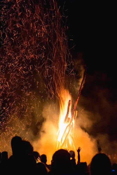 a large bonfire for the summer solstice in the Carpathians