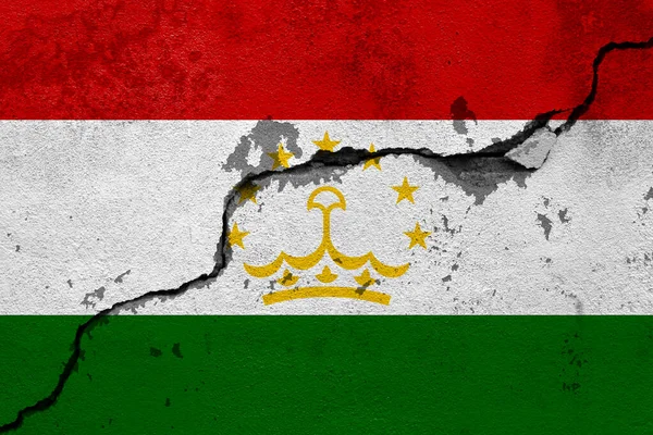 Землетрясения Таджикистане Флаг Таджикистана Стене Трещинами Землетрясения — стоковое фото