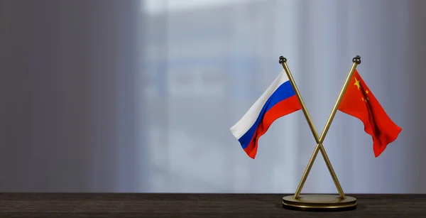 Флаги России Китая Столе Переговоры Между Китаем Россией Маленьком Размытом — стоковое фото