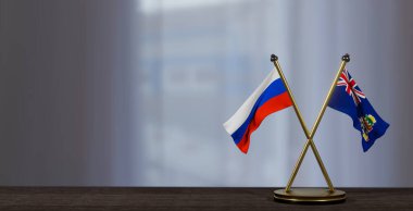 Masada Rusya ve Cayman Adaları bayrakları var. Cayman Adaları ve Rusya arasındaki görüşmeler. Küçük bulanık bir arkaplanda. 3B çalışma ve 3B resim