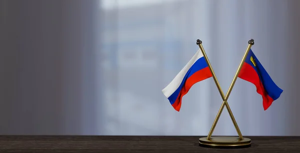 stock image Russia and Liechtenstein flags on table. Negotiation between Liechtenstein and Russia. on little blur background. 3D work and 3D image