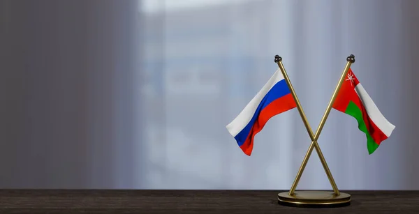 stock image Russia and Oman flags on table. Negotiation between Oman and Russia. on little blur background. 3D work and 3D image