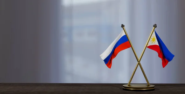 ロシアとフィリピンはテーブルの上に旗を掲げる フィリピンとロシアの交渉 少し背景をぼかすだけです 3D作品と3D画像 — ストック写真