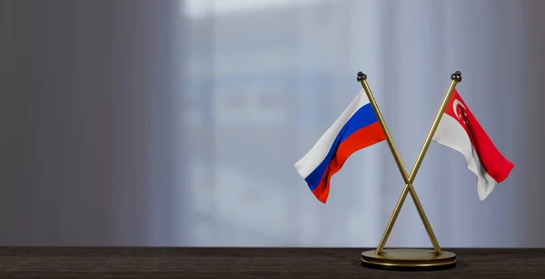 stock image Russia and Singapore flags on table. Negotiation between Singapore and Russia. on little blur background. 3D work and 3D image