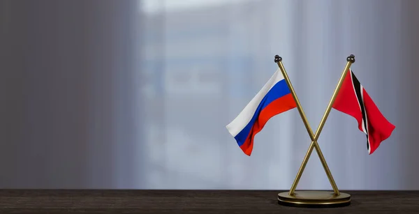 俄罗斯和特立尼达和多巴哥的国旗在桌面上 特立尼达和多巴哥与俄罗斯之间的谈判 背景有点模糊 3D作品和3D图像 — 图库照片