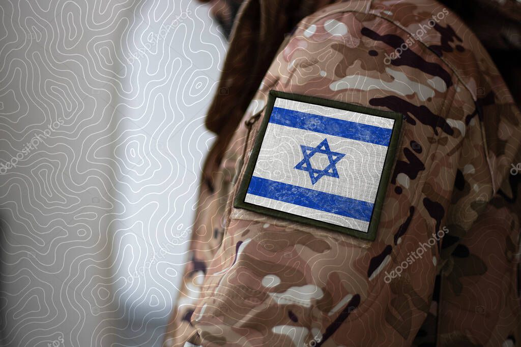 Israel Soldier. Soldier with flag Israel, Israel flag on a military uniform. Camouflage clothing