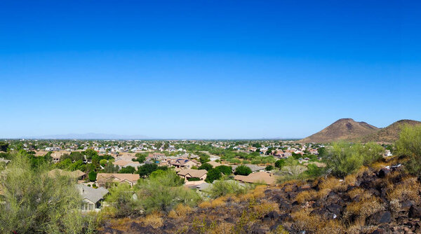North-West side of Valley of the Sun looking at Arizona cities of Phoenix and Glendale Vision Hills hiking trails; copy space