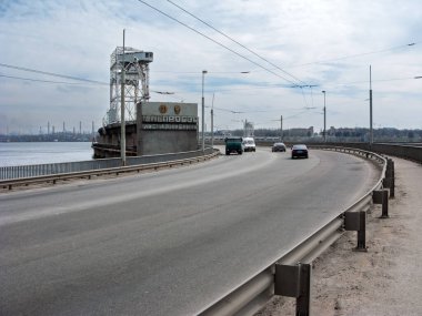 Zaporizhzhya, UA - March 30, 2009:  Original memorial set to display name in Cyrillic letters and honorable rewards at historic hydroelectric power station dam built in the USSR with USA help between 1927-1932. clipart