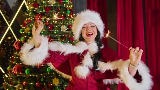 Happy Woman Mrs Santa Plays Sparklers Sparks Delight Her — Stock Video