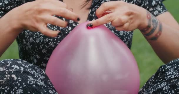 Happy Joyful Woman Inflates Balloons Burst Showing Everything Wrong Condoms — Stockvideo
