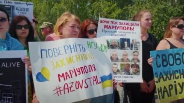 Ukrainian women and men gathered for a peaceful rally in support of the Azov prisoners of war, and the victims in Olenevka and Mariupol, demand the release of prisoners. Rally for freedom. No war in