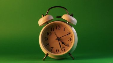 analog clock goes on a green screen, timelapse, fast passage of time