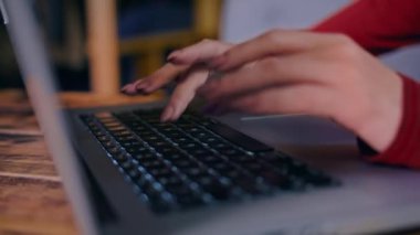 close-up. the girls fingers are typing on the computer keyboard. business time. rest and work