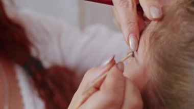 cosmetics and work as a stylist and makeup artist, women paint lips, eyes, face,