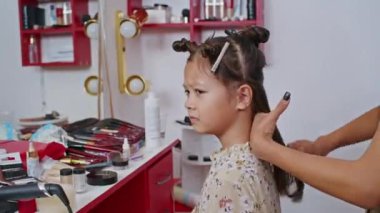 cosmetics and work as a stylist and makeup artist, women paint lips, eyes, face,
