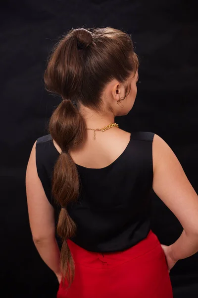 stock image portrait shot of a young Ukrainian woman on the background, after make-up and hairstyle, for clothing advertising.