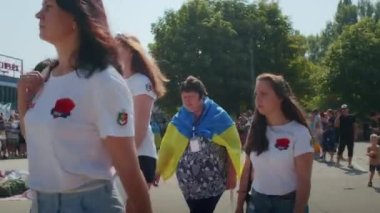 Ukrainian women and men gathered for a peaceful rally in support of the Azov prisoners of war, and the victims in Olenevka and Mariupol, demand the release of prisoners. Rally for freedom. No war in