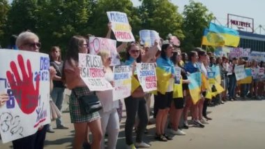 Ukrainian women and men gathered for a peaceful rally in support of the Azov prisoners of war, and the victims in Olenevka and Mariupol, demand the release of prisoners. Rally for freedom. No war in