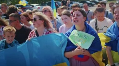 Ukrainian women and men gathered for a peaceful rally in support of the Azov prisoners of war, and the victims in Olenevka and Mariupol, demand the release of prisoners. Rally for freedom. No war in