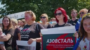 Ukrainian women and men gathered for a peaceful rally in support of the Azov prisoners of war, and the victims in Olenevka and Mariupol, demand the release of prisoners. Rally for freedom. No war in