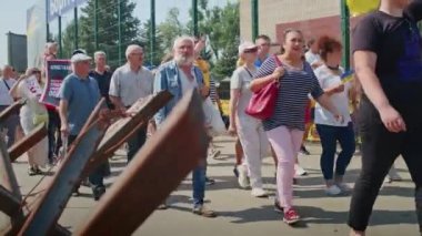 Ukrainian women and men gathered for a peaceful rally in support of the Azov prisoners of war, and the victims in Olenevka and Mariupol, demand the release of prisoners. Rally for freedom. No war in