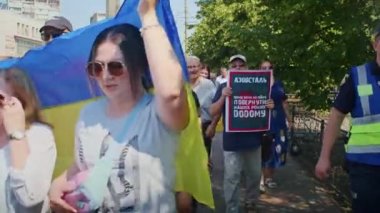 Ukrainian women and men gathered for a peaceful rally in support of the Azov prisoners of war, and the victims in Olenevka and Mariupol, demand the release of prisoners. Rally for freedom. No war in
