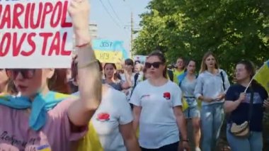 Ukrainian women and men gathered for a peaceful rally in support of the Azov prisoners of war, and the victims in Olenevka and Mariupol, demand the release of prisoners. Rally for freedom. No war in