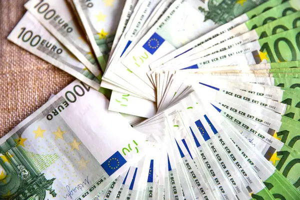 stock image Close-up of 100 Euro Banknotes Laid Out on a Table