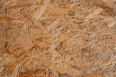 OSB tahtasının güneş ışığında yakın çekim dokusu