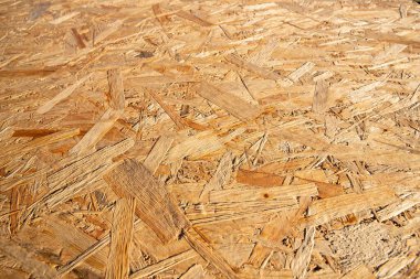 OSB tahtasının güneş ışığında yakın çekim dokusu