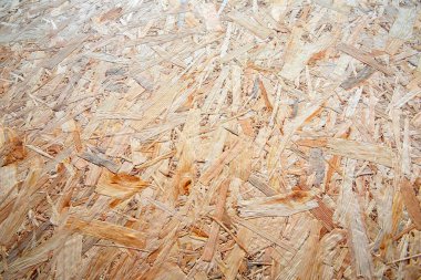 OSB yönetim kurulunun çok renkli ahşap talaşlarıyla yakın çekim dokusu