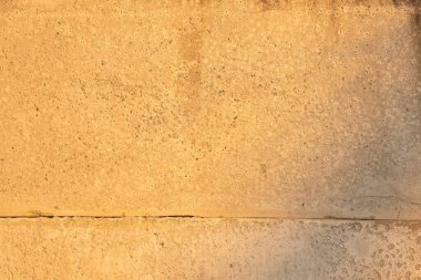 Sert gözenekli beton yüzey, inşaat malzemesinin dokusu.