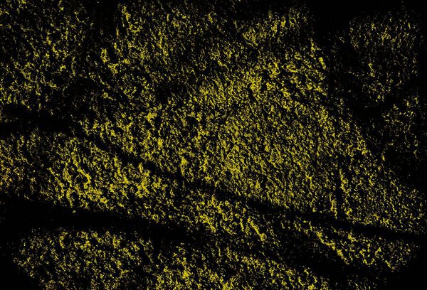 Абстрактная черно-желтая гранжевая текстура с грубым поверхностным и контрастным эффектом