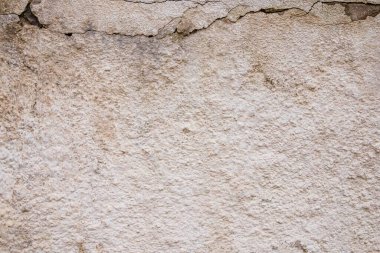 çatlaklardan ve çiziklerden oluşan bir duvarın dokusu