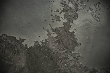 Lekeli ve nemli beton dokusu, inşaat malzemesi arka planı.