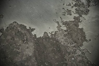 Lekeli ve nemli beton dokusu, inşaat malzemesi arka planı.