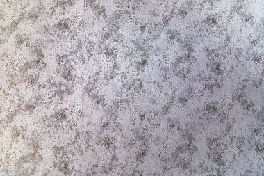 Gri ve kahverengi benekli dekoratif duvar dokusu, eski alçı ya da eski yüzeye benziyor. Arkaplan, dizayn şablonları, iç modeller ve mimari projeler için ideal.