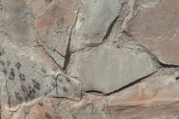 Holprige Beige Steinoberfläche Eine Alte Mauer Mit Dem Schatten Einer — Stockfoto