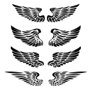 Beyaz arka plan üzerinde yalıtılmış bağbozumu vektör kanatları kümesi. Tasarım